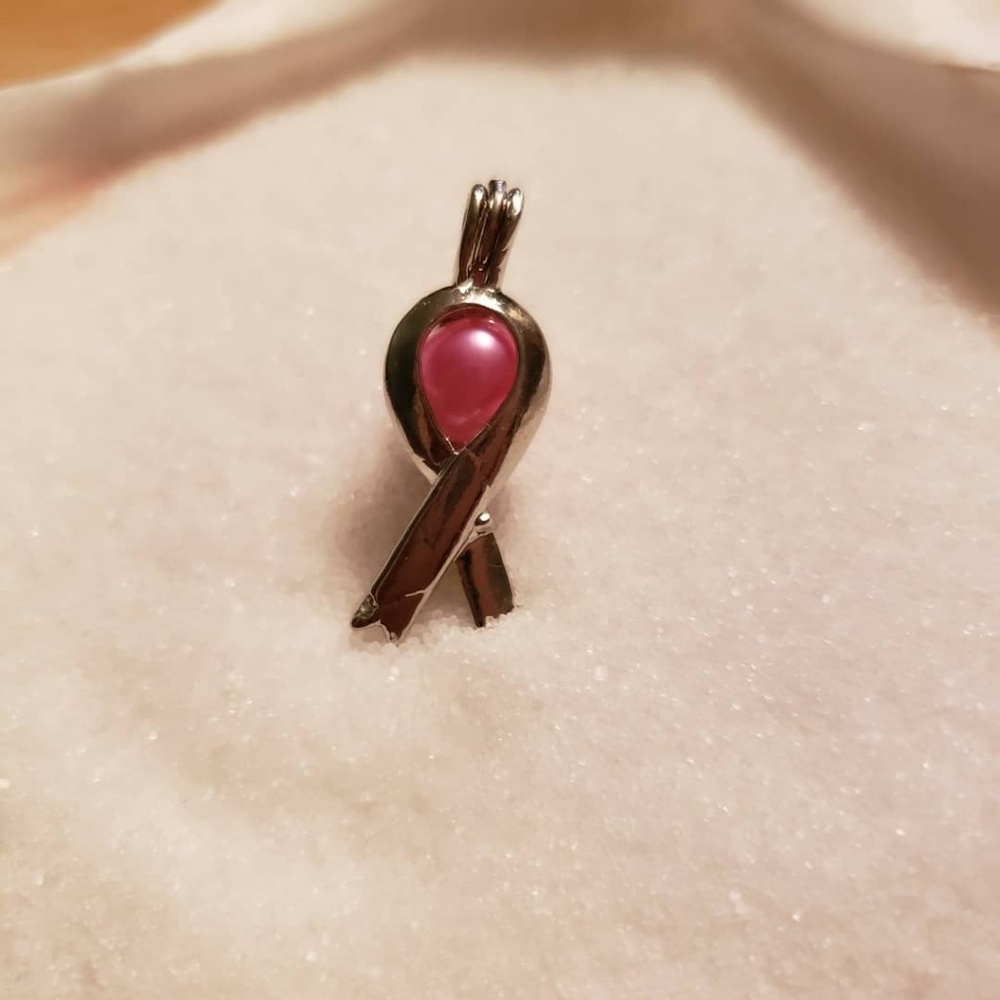 Silver plated pendants with a real saltwater pearl